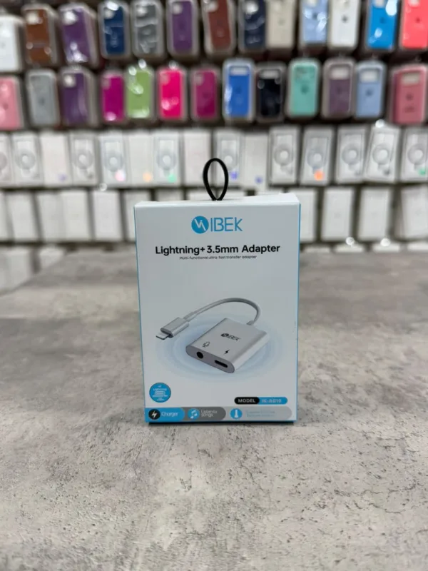 Adaptador Lightning + 3.5mm a c